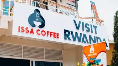 Issa Coffee VIP entrance with Visit Rwanda signage